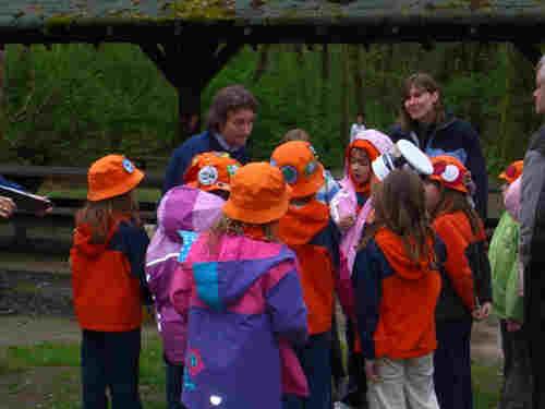 kids getting instructions from their school teacher before the release