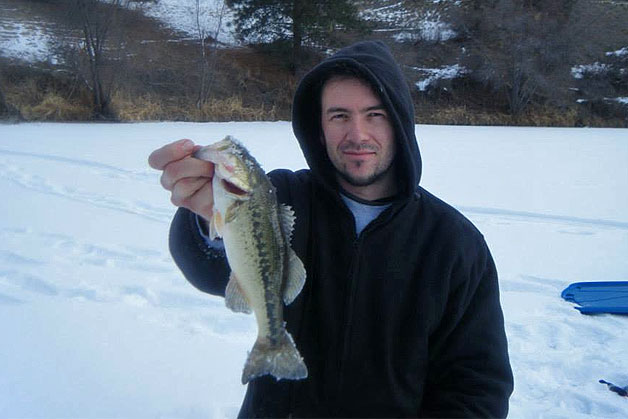 The author with a frosty largemouth bass The author with a frosty largemouth bass